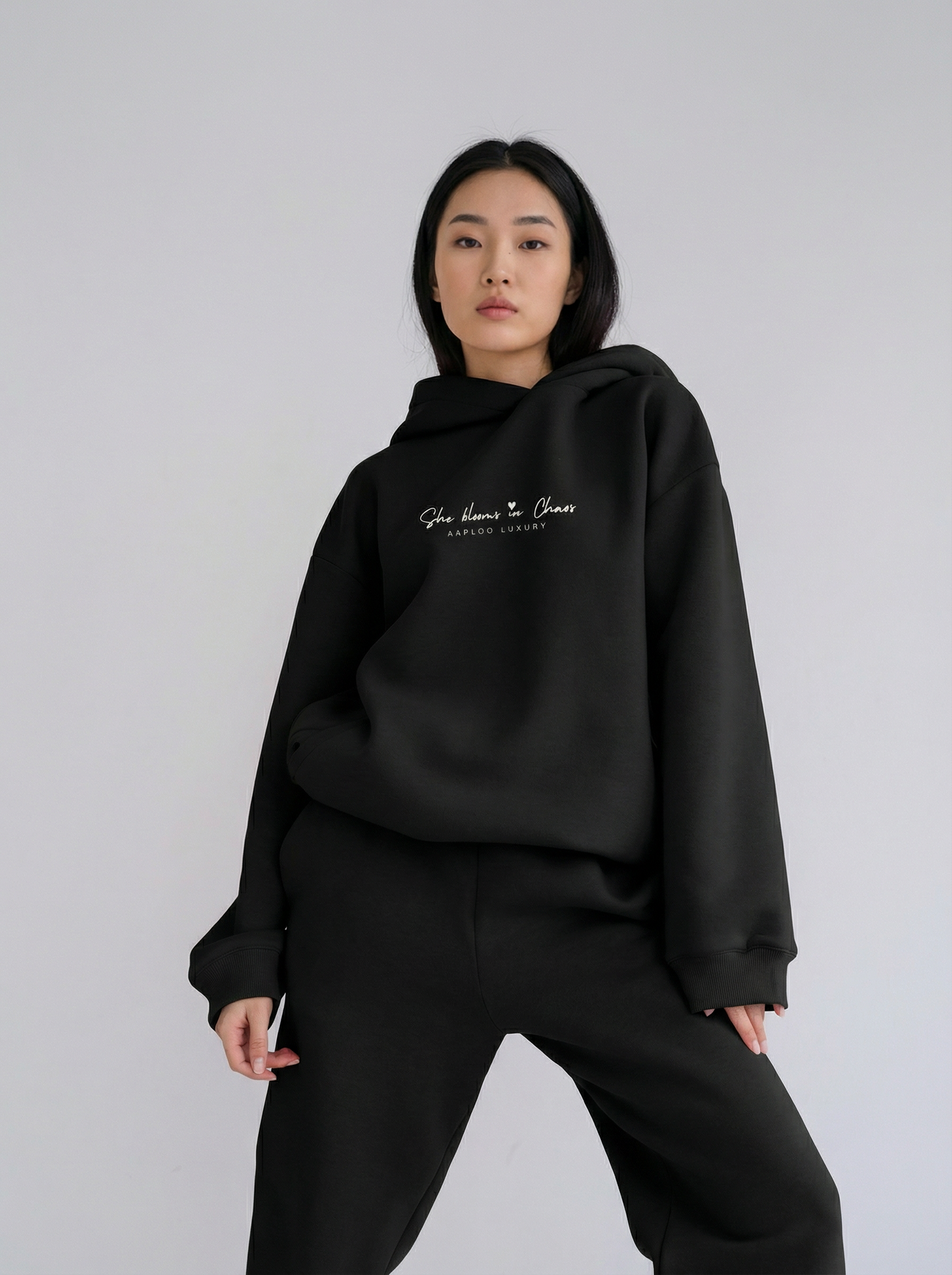 She Blooms in Chaos Hoodie – Black | Aaploo Luxury