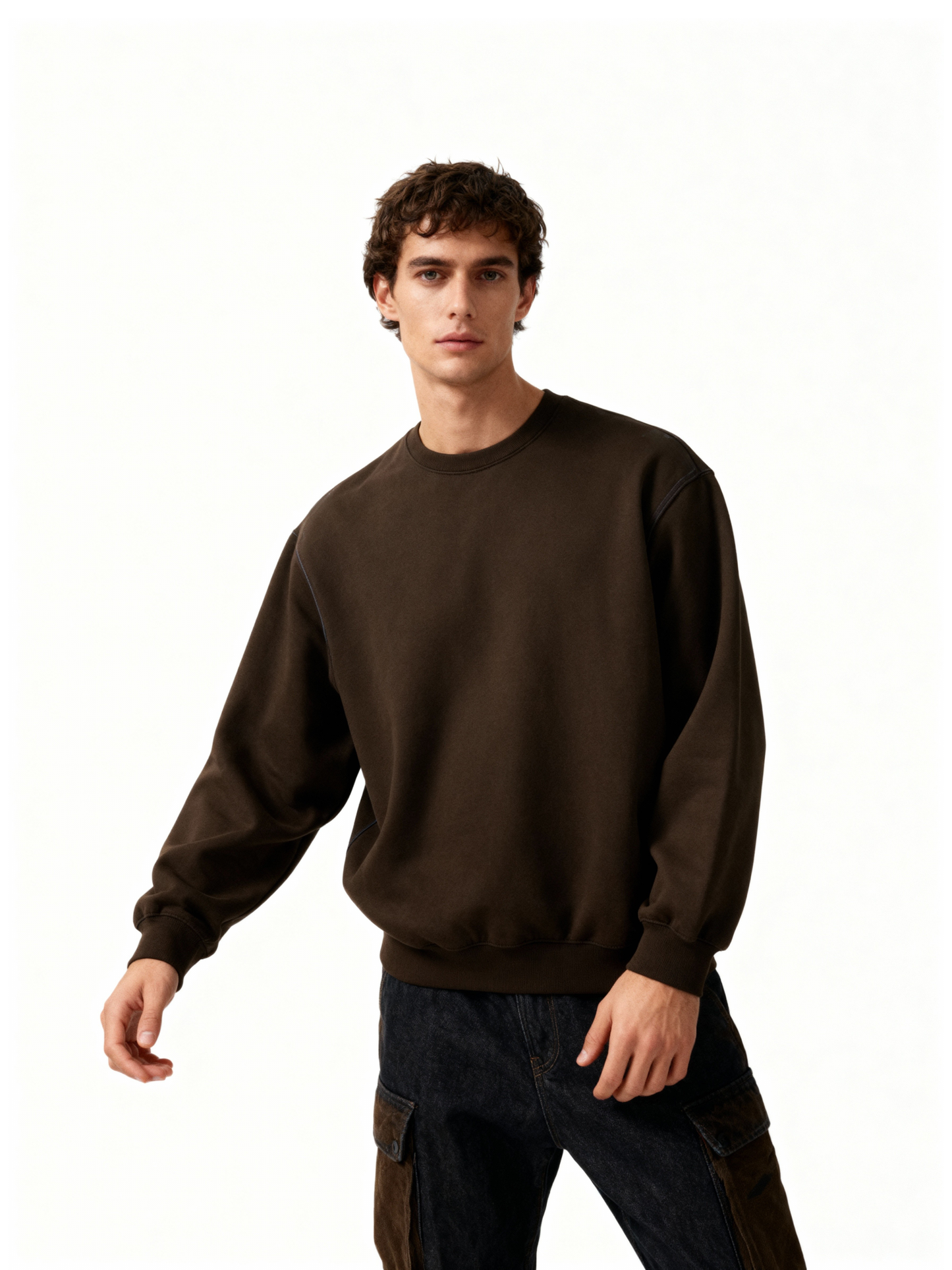 Man wearing a brown sweatshirt on a white background