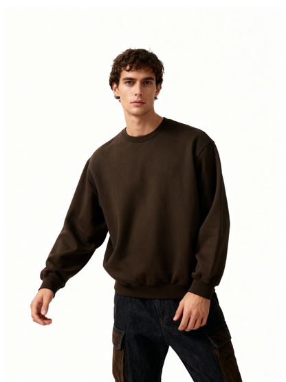 Man wearing a brown sweatshirt on a white background