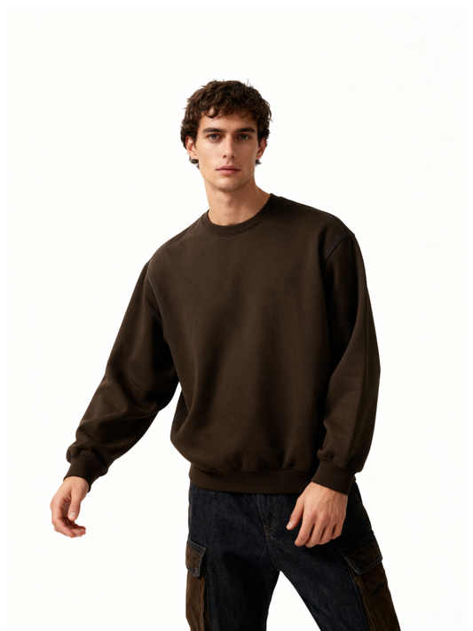 Man wearing a brown sweatshirt on a white background