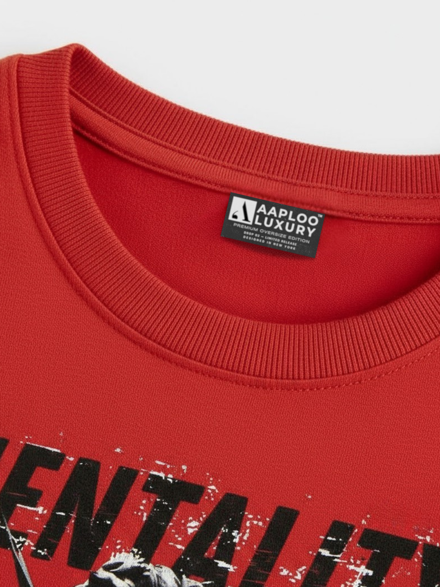 Red sweatshirt with a visible brand label on a white background aaploo luxury