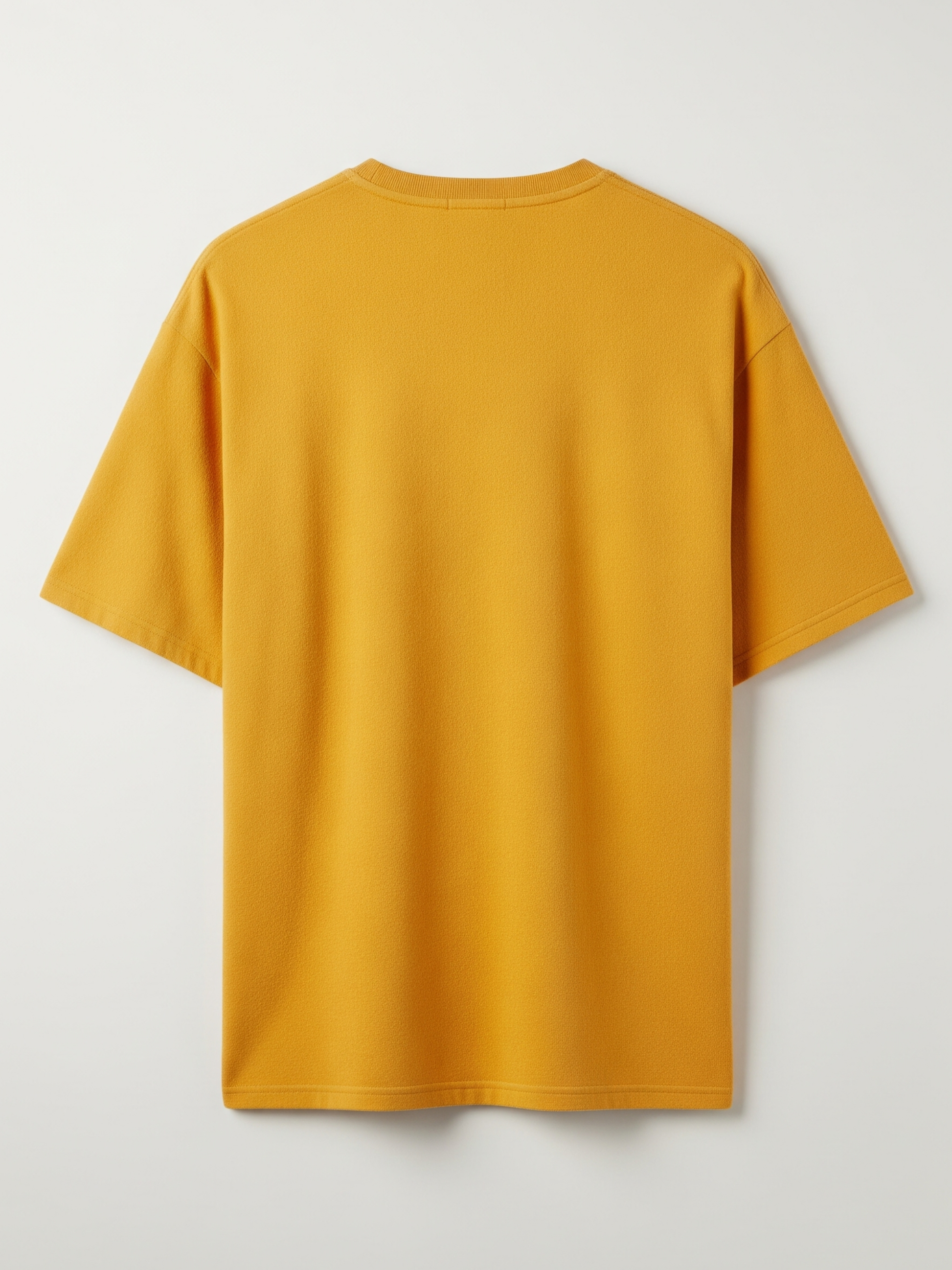 Yellow t-shirt on a light gray background