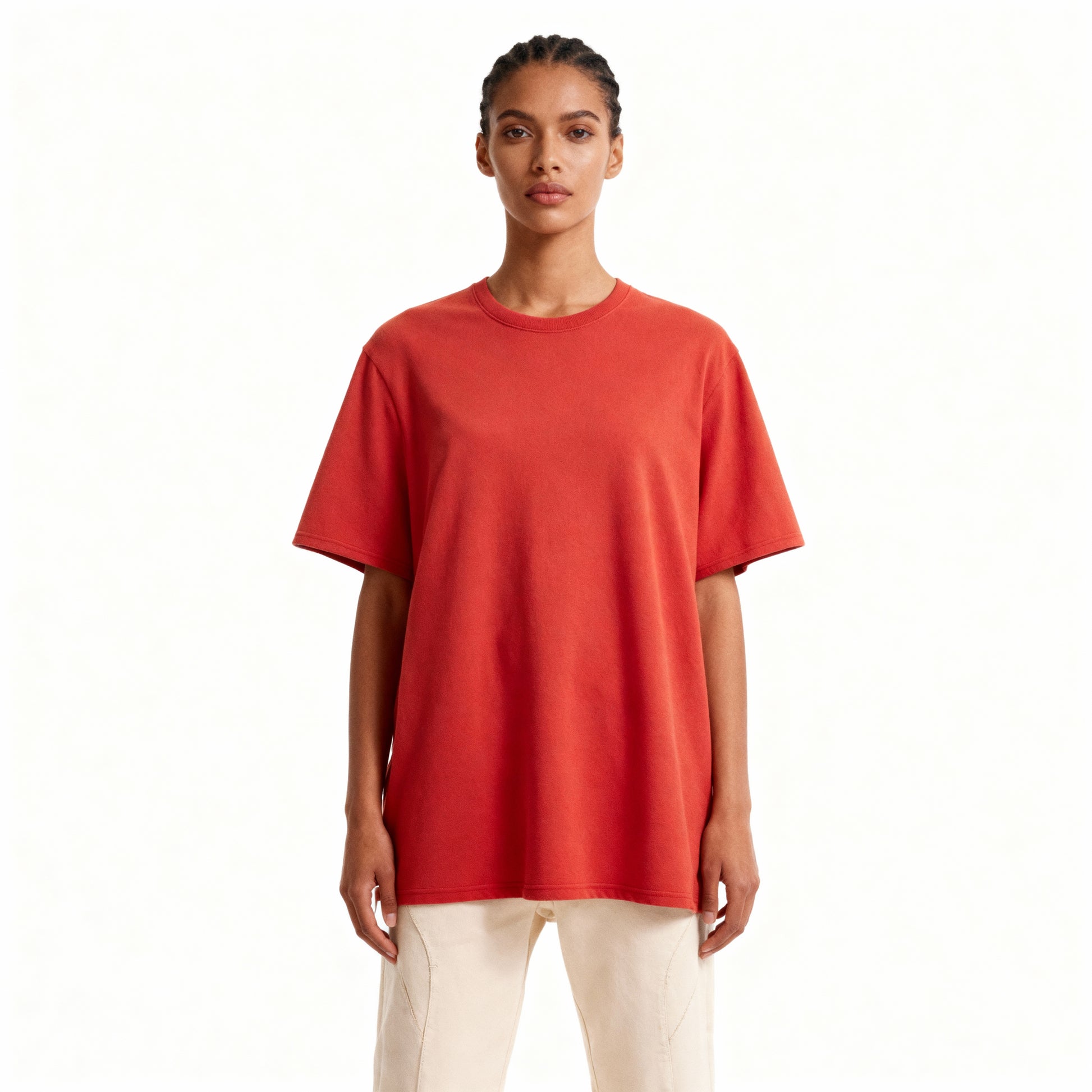 Person wearing a red t-shirt on a white background