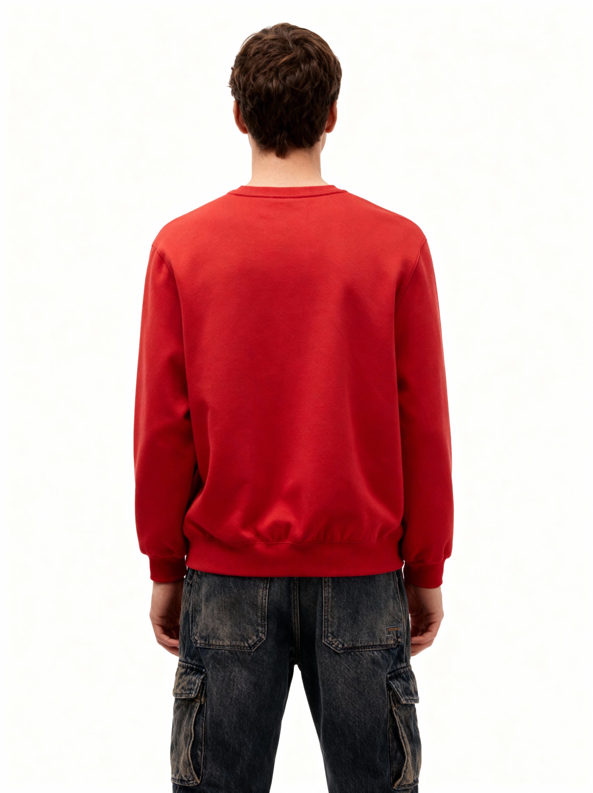 Person wearing a red sweatshirt on a white background