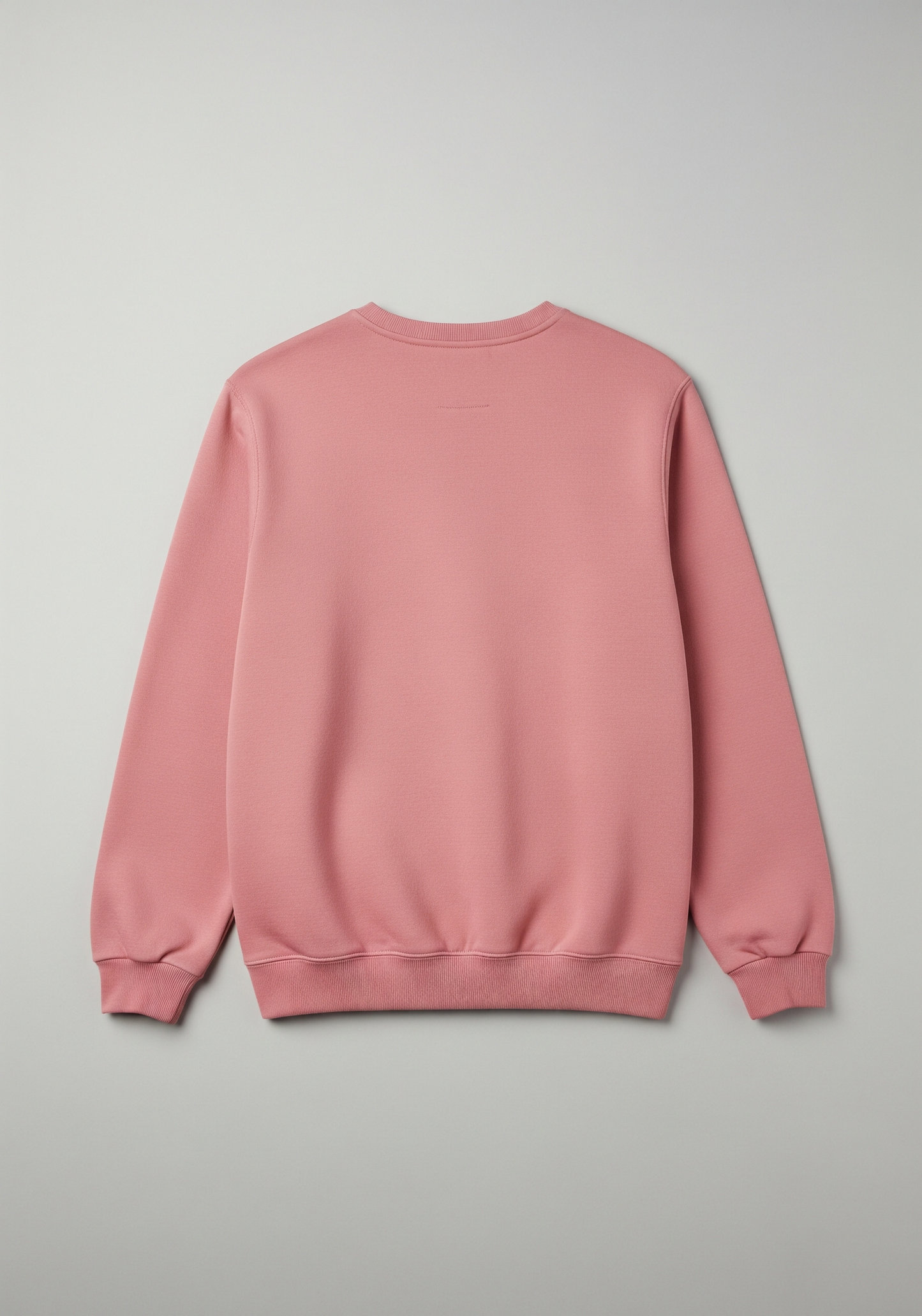 Pink sweatshirt on a light gray background