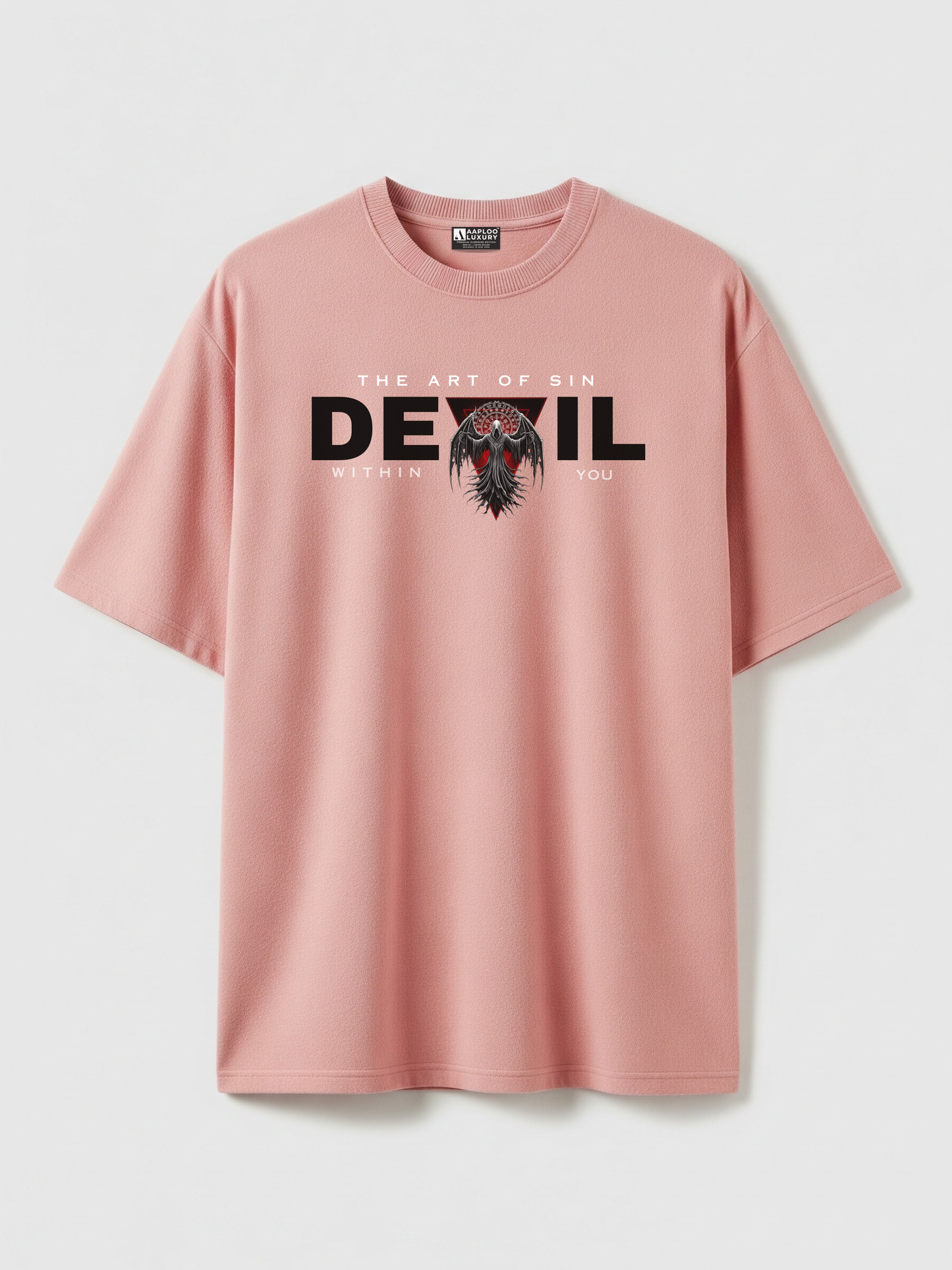 Pink t-shirt with 'The Art of Sin Devil Within You' graphic on a light gray background