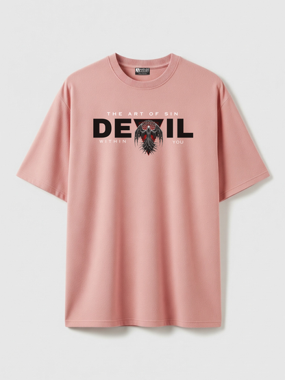 Pink t-shirt with 'The Art of Sin Devil Within You' graphic on a light gray background